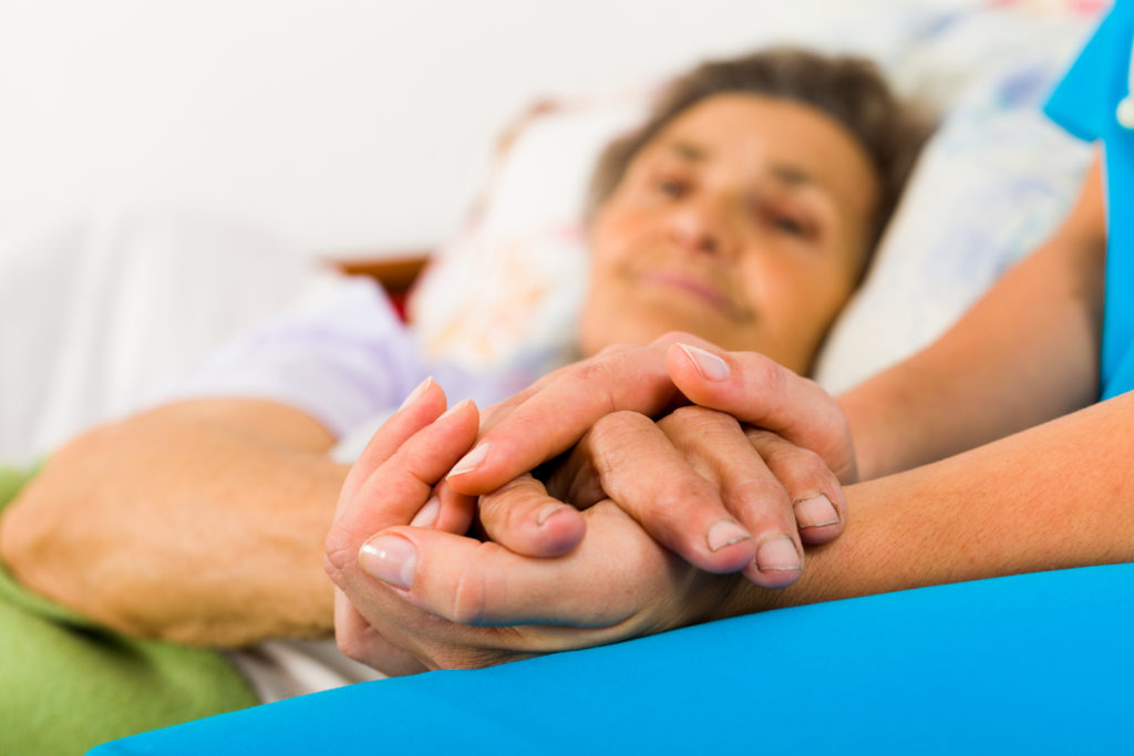 Lady holding hand